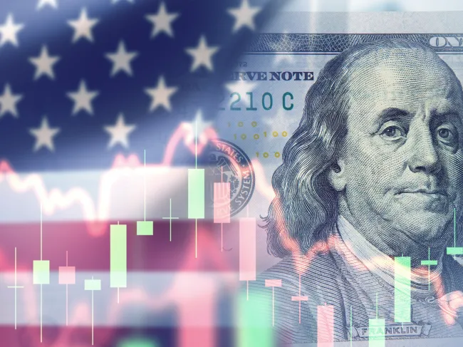 US flag blended with a hundred-dollar bill and financial stock chart